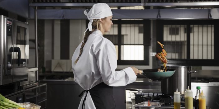 female-chef-kitchen-frying-food